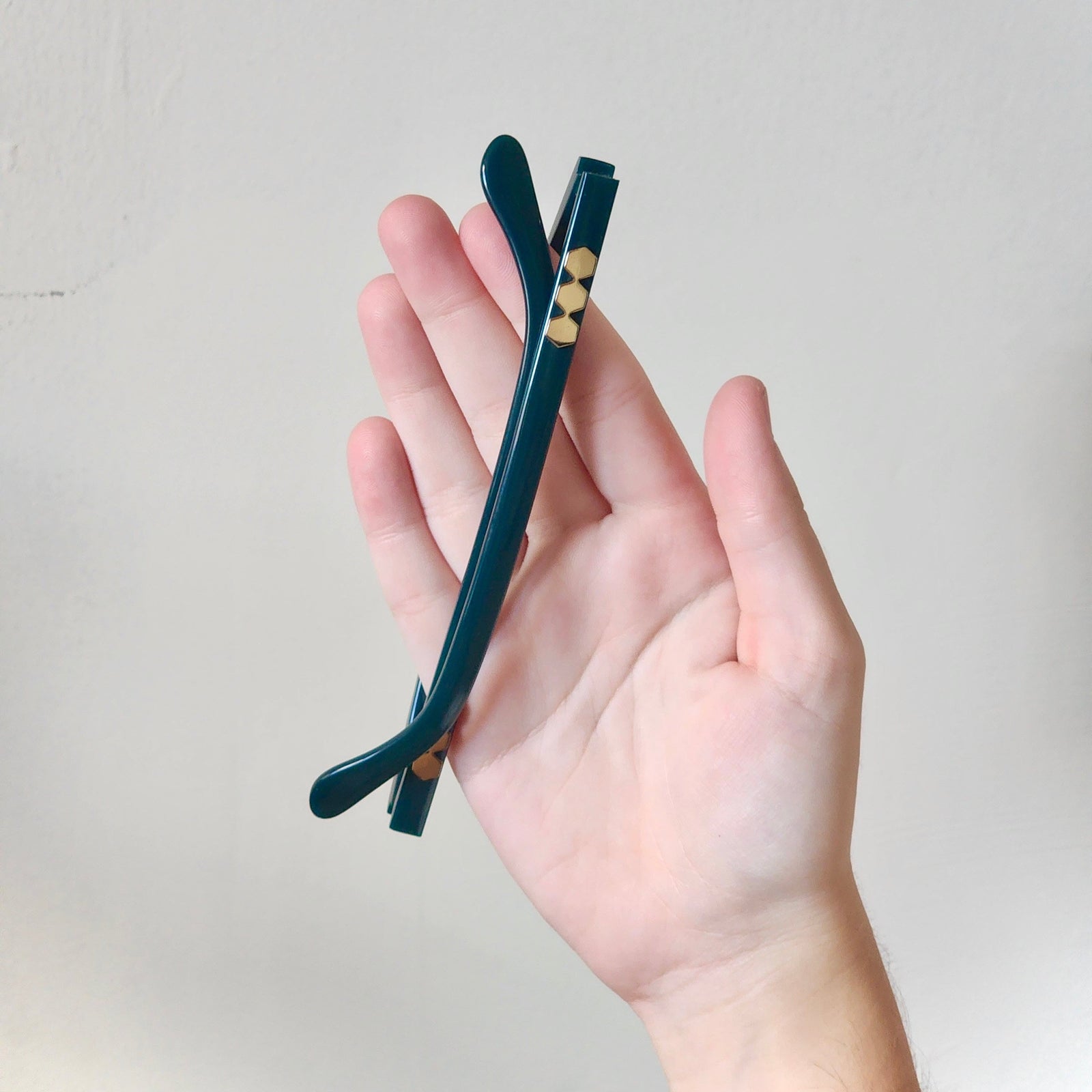 Juniper Green Headband. Goes on like sunglasses. Foldable. Luxury acetate.